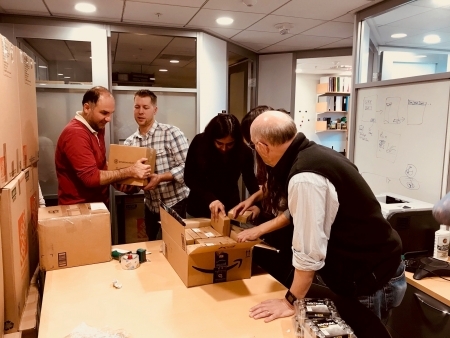 Photo: Preparing additional items (i.e., batteries, radios) for shipment