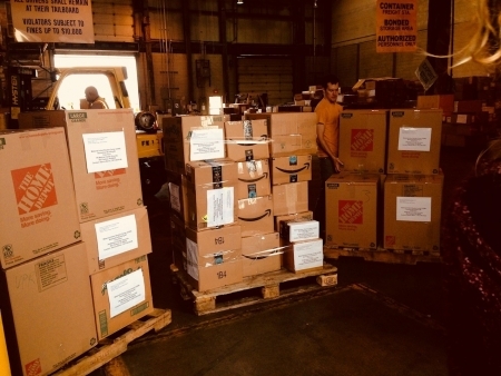 Photo: 3 pallets (of many) ready for weighing at the JetBlue cargo facility