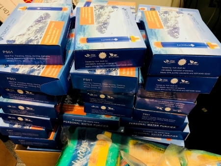 Photo: Nearly 225 donated water filters stacked in an office at Harvard